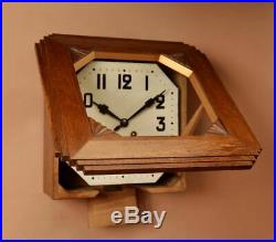 A French Oak Art Deco Wall Clock. Circa 1910