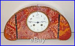 A Spectacular Exotic Marble French'Art Deco' Clock Set, circa 1920