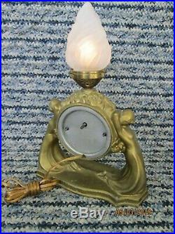 Antique Art Deco nude lady figural spelter clock with flame lamp vintage 1930's