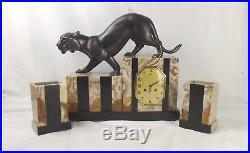 Art Deco Three Piece Marble And Onyx Clock Garniture With Spelter Panther