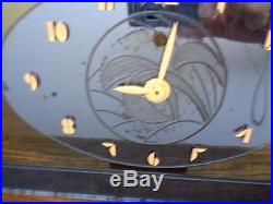 G. E. Model 6H02 art deco blue glass/mirrored clock works well