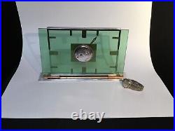 OMEGA Art Deco 8 Day Clock Mixed Metals Floating in Green Glass Circa 1933