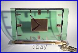 OMEGA Art Deco 8 Day Clock Mixed Metals Floating in Green Glass Circa 1933
